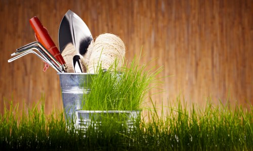 Gardener preparing soil in Stratford garden
